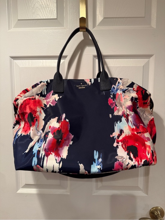 kate spade Handbags - Kate Spade Blurry Floral & Navy Blue Weekender Duffle Bag